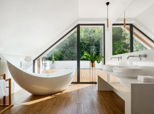 Bathroom sink with plant and towels